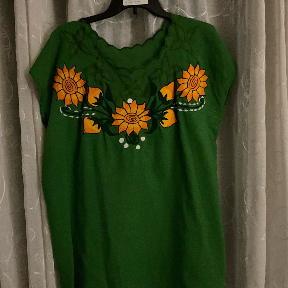 Dark green shirt with bright sun flowers & little ruffle design at the neck